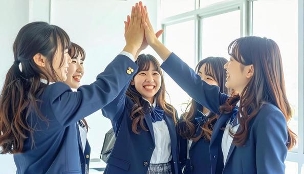 喜びを分かち合う学生 喜びを分かち合う学生の写真