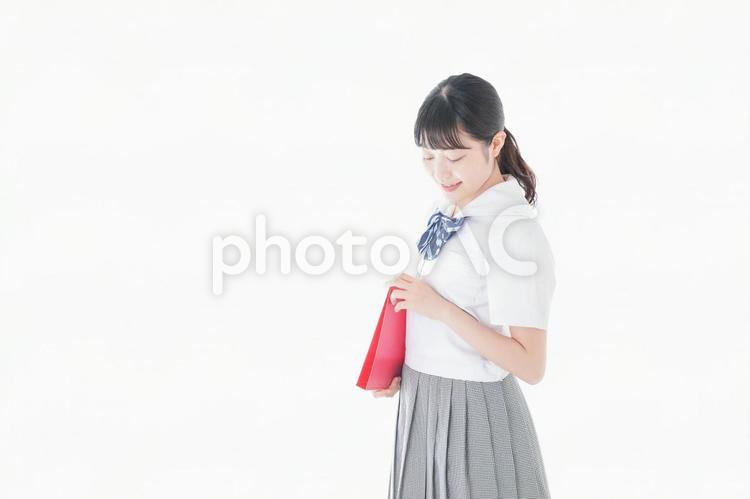 笑顔の制服を着た女子学生 進学,規則,セーラー服の写真素材