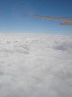雲の上の青空 上空,雲,雲の上の写真素材