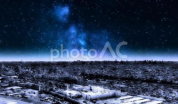 都会の街並みと星空・イメージ 都会,都心,星空の写真素材