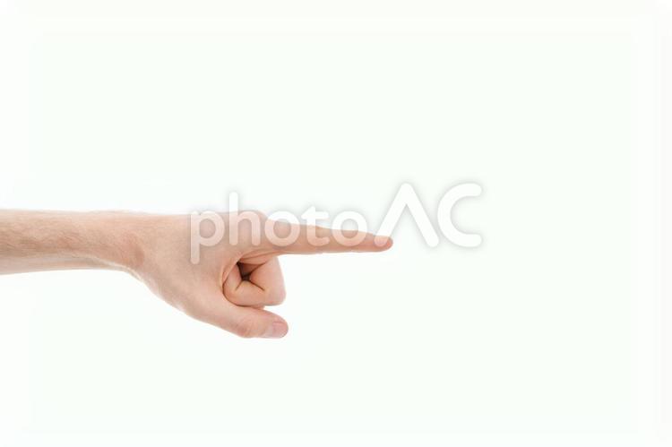 右の方を指差す左手 指差し,指示,案内の写真素材