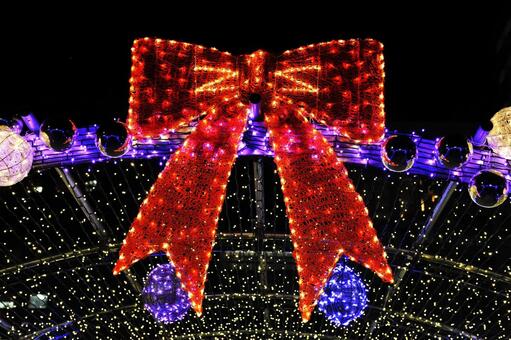 クリスマスイルミネーション	 イルミネーション,りぼん,ライトアップの写真素材