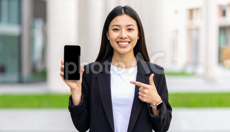 おすすめの指をさす人 女性,春,若者の写真素材