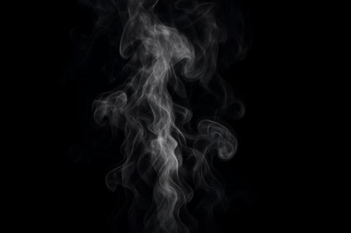 黒の背景に蒸気が立ち昇る様子・演出効果, 黒の背景に蒸気が立ち昇る様子・演出効果,の写真