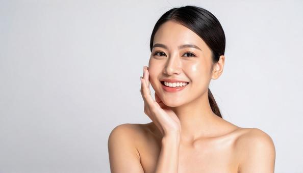 頬に右手を添える女性 頬に右手を添える女性の写真