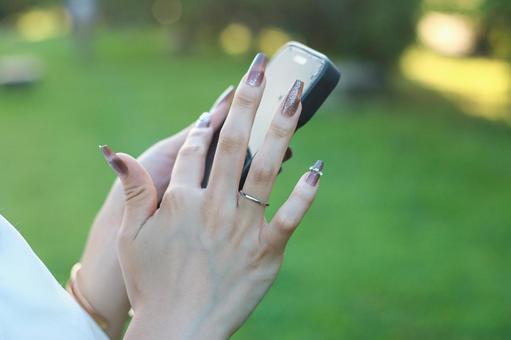 スマホの操作中 スマホ,スマートフォン,スマホ依存症の写真素材