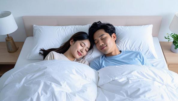 眠る夫婦 眠る夫婦の写真