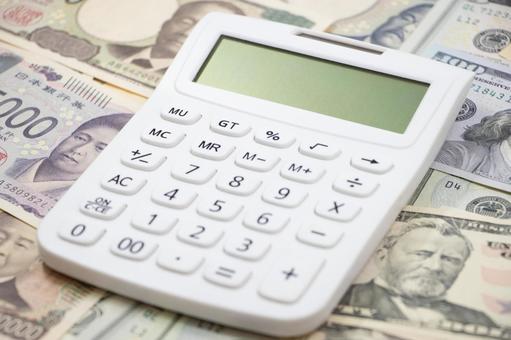 ドル紙幣 日本円 電卓 ドル紙幣,日本円,電卓の写真素材