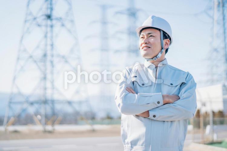 電気工事士・電力会社・作業着を着た男性 電力会社,電気工事士,作業員の写真素材