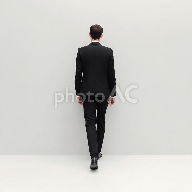 ビジネスシーンを演出する、スーツの後ろ姿 男性,スーツ,黒の写真素材