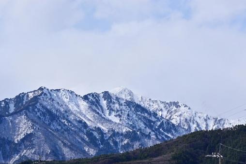 信州風景～雲かかる北アルプス爺ヶ岳～ 北アルプス,爺ヶ岳,大町市の写真素材