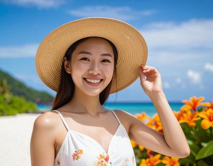 花咲く海辺・夏空と麦わら帽子の彼女の写真
