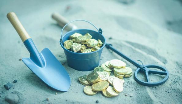金を掘るイメージ 金塊と金属探知機 金を掘るイメージ 金塊と金属探知機の写真