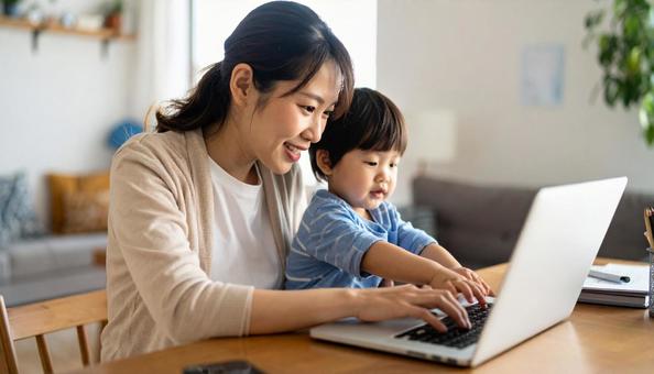 A mother working remotely and looking at a computer with her child, computer, screen, child, JPG