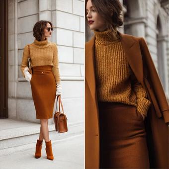 モダンでスタイリッシュな女性の秋の装いの写真