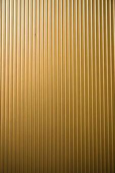 【背景素材】金属表面、ゴールド、縦 【背景素材】金属表面、ゴールド、縦の写真