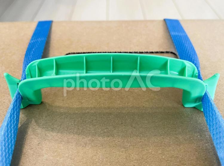 ダンボール荷物を持ち運ぶための取っ手１ 取っ手,持ち手,ダンボールの写真素材