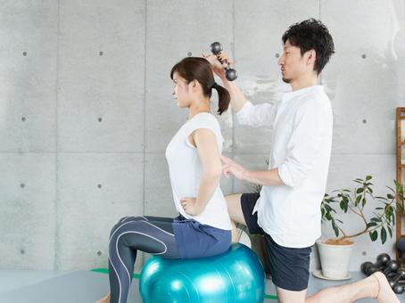 Japanese woman receiving dumbbell training from a personal trainer, female, guide, dumbbell, JPG