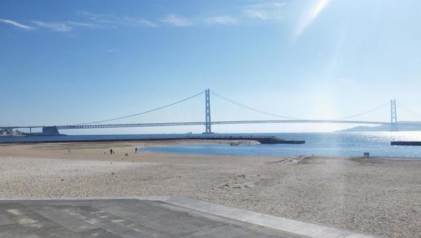 大蔵海岸から見た明石海峡大橋と淡路島 海,神戸市垂水区,大蔵海岸の写真素材