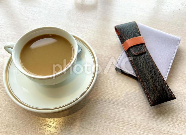 コーヒーと筆記用具 コーヒータイム,ミーティング,仕事の写真素材