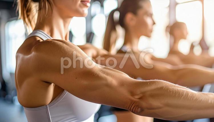 トレーニングをする女性のポートレート　腕 トレーニング,フィットネス,スポーツジムの写真素材