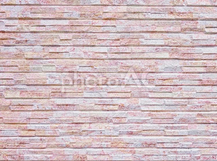 淡いピンク色　石目調の外壁おしゃれな背景 壁,石目調,ピンクの写真素材