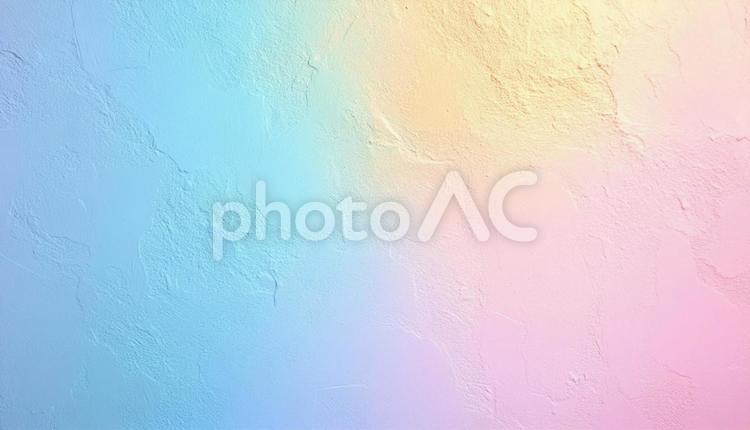 筆跡が残る虹色のペンキが塗られた壁 虹,ペンキ,絵の具の写真素材