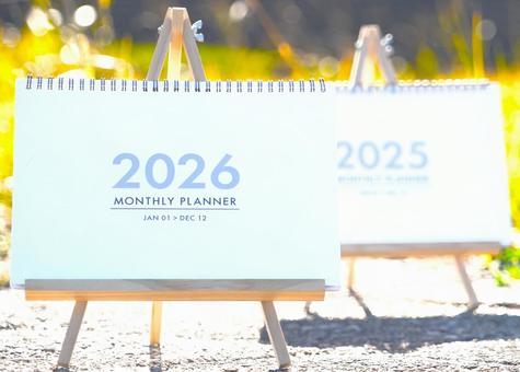 カレンダー（2025→2026）重なり カレンダー,年越し,年賀状の写真素材