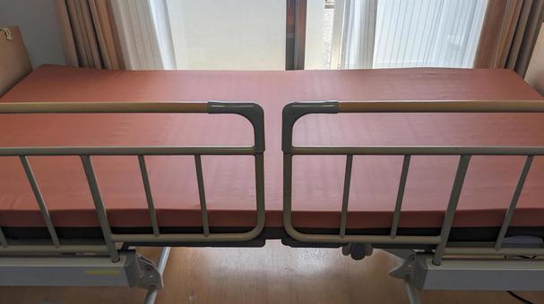 Nursing care bed with railings, JPG