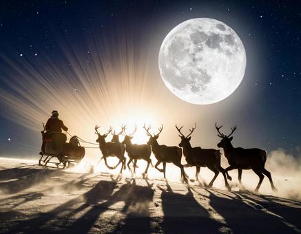 サンタと満月の写真素材の写真