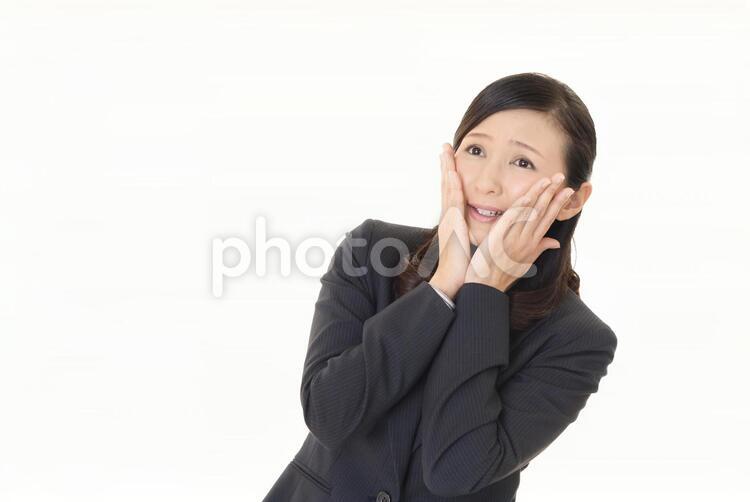 困惑した表情のビジネスウーマン 女性,ビジネウーマン,女の写真素材