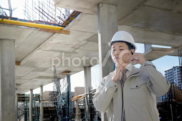 工事現場と作業員 建設現場,工事現場,現場監督の写真素材