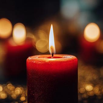 暖かい雰囲気の赤いロウソクの写真