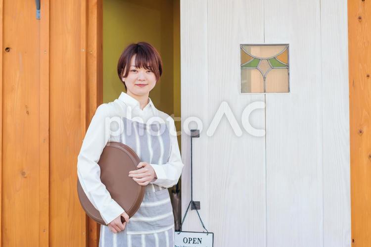 カフェ・飲食店・レストランのスタッフ ウェイトレス,ウエイトレス,カフェの写真素材
