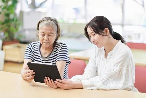 Mother and child looking at the tablet together, tablet, to see, parenting, JPG