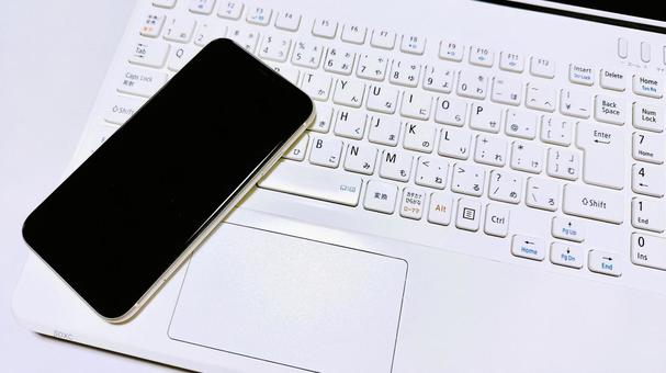 ビジネスアイテム スマホとパソコン 同期 ビジネスアイテム スマホとパソコン 同期の写真