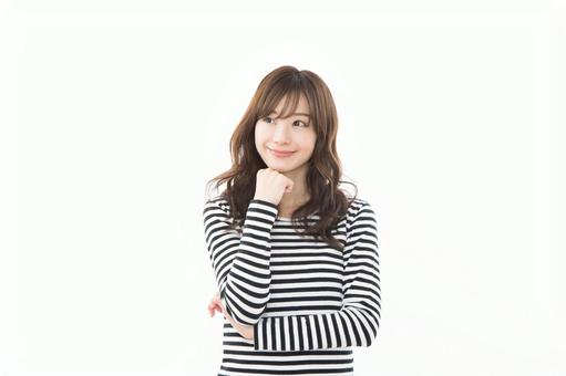 若い女性 ボーダー 考える 若い女性 ボーダー 考えるの写真