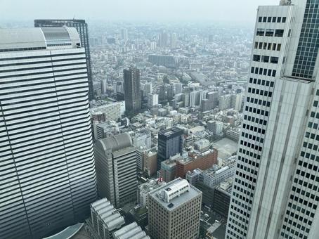 曇り空の都会を見下ろすビルの景色 曇り空の都会を見下ろすビルの景色 ビル,都市,高層ビルの写真素材