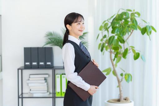 受付のビジネスウーマン 受付,女性,笑顔の写真素材