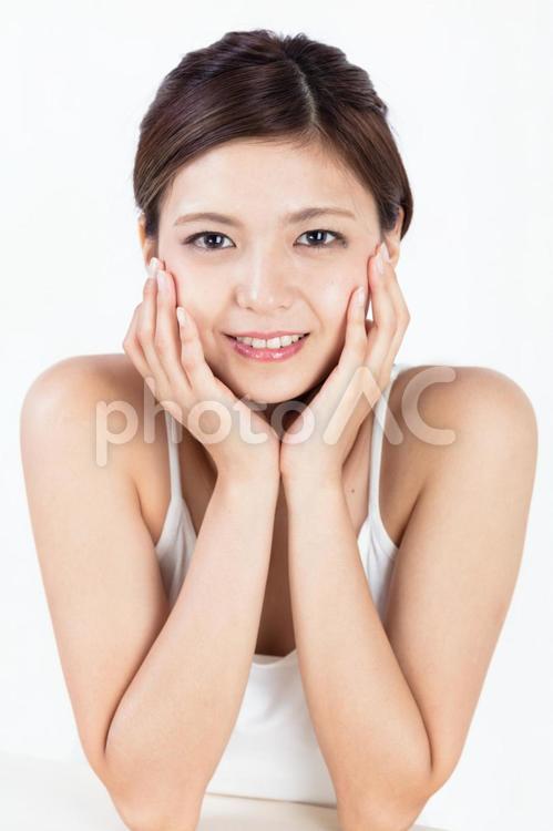 小顔　フェイシャルエステ 女性,女,ビューティーの写真素材