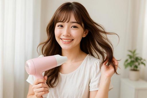 ドライヤーで髪を乾かす ドライヤーで髪を乾かすの写真