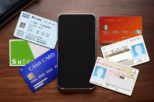 スマホと財布とカードもろもろ スマホと財布とカードもろもろの写真