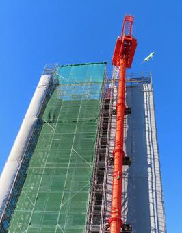 マンション工事現場 タワークレーン マンション工事現場 タワークレーン マンション工事,工事現場,タワークレーンの写真素材
