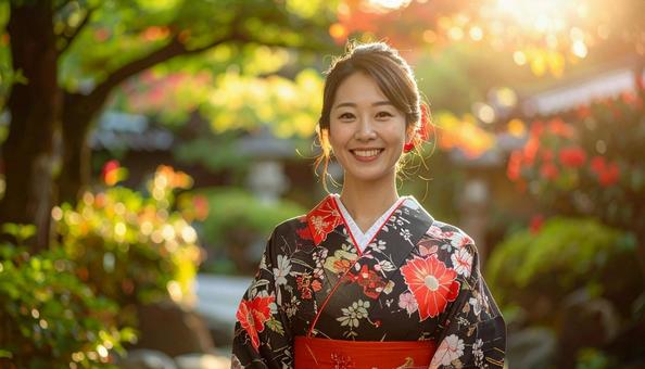カメラ目線の若い和服の女性 カメラ目線の若い和服の女性の写真