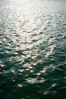 夕焼けの海 海,ビーチ,砂浜の写真素材