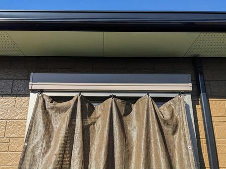 戸建てに設置している日除けシェード 戸建てに設置している日除けシェード 戸建て,日除けシェード,平屋の写真素材
