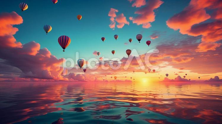 サンセットカラーの空に浮かぶ風船の写真 太陽,サンセット,風景の写真素材