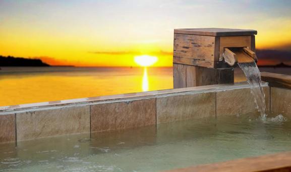 Open-air bath with a view of the setting sun Open-air bath with a view of the setting sun
