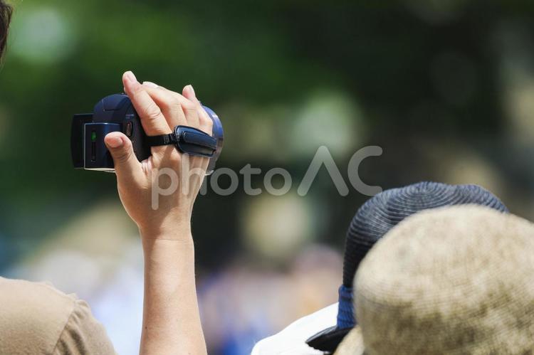運動会の撮影 ビデオ,手,運動会の写真素材