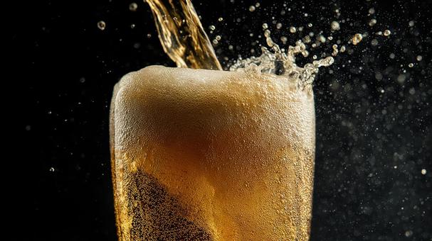 喉越し最高の冷たいビール 喉越し最高の冷たいビールの写真